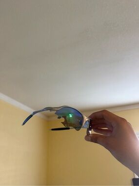 Silver Frame Sunglasses with Blue-Green Mirrored Lenses Oakley